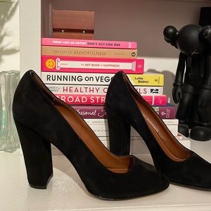 Black peep toe suede pumps